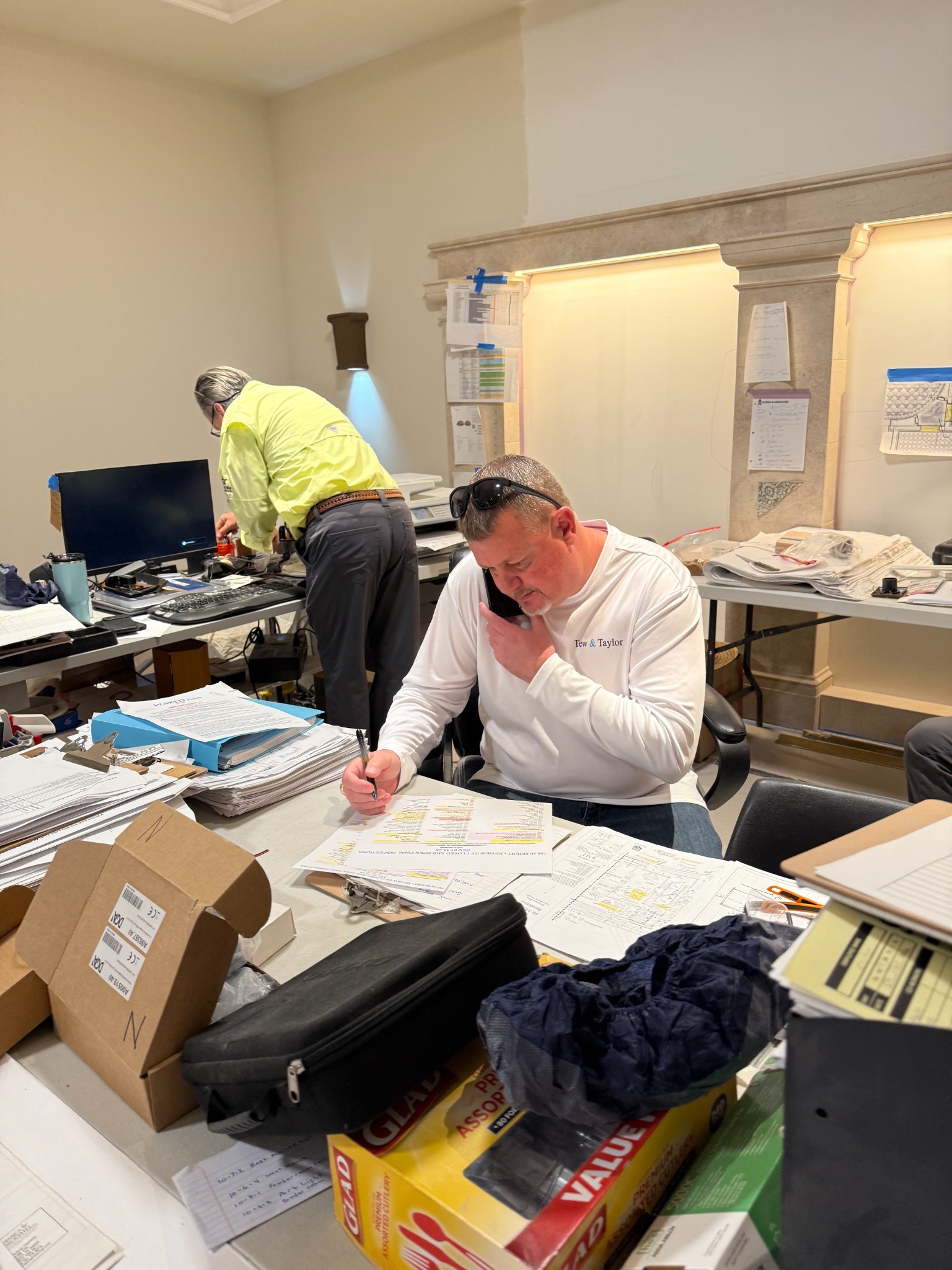 Tew & Taylor inspector coordinating project review and client communication